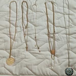 Bundle layering necklaces